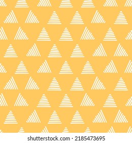 Beige seamless pattern with white triangles  pattern.