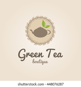 Beige teapot in a frame with leaves of green tea. Vector logo template for tea store, cafe or banner