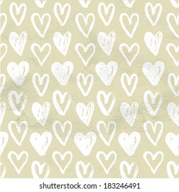 Beige vintage seamless pattern of hand drawn of white paint hearts