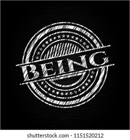 Being chalk emblem written on a blackboard