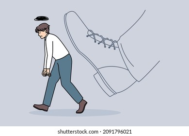 Being fired and kicked out concept. Young stressed sad man worker office manager going away with huge boot shoe kicking him out vector illustration 