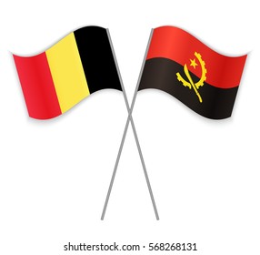 Belgian and Angolan crossed flags. Belgium combined with Angola isolated on white. Language learning, international business or travel concept.