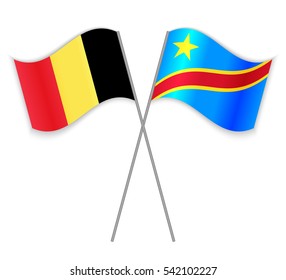 Belgian and Congolese crossed flags. Belgium combined with Democratic Republic of the Congo isolated on white. Language learning, international business or travel concept.