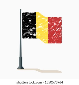 Belgian flag with scratches, vector flag of Belgium waving on flagpole with shadow.
