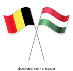 Belgian and Hungarian crossed flags. Belgium combined with Hungary isolated on white. Language learning, international business or travel concept.