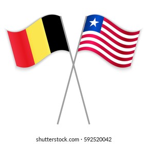 Belgian and Liberian crossed flags. Belgium combined with Liberia isolated on white. Language learning, international business or travel concept.
