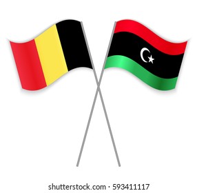 Belgian and Libyan crossed flags. Belgium combined with Libya isolated on white. Language learning, international business or travel concept.