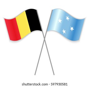 Belgian and Micronesian crossed flags. Belgium combined with Micronesia isolated on white. Language learning, international business or travel concept.