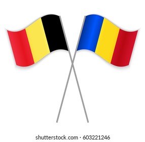 Belgian and Romanian crossed flags. Belgium combined with Romania isolated on white. Language learning, international business or travel concept.