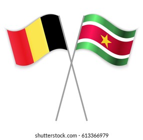 Belgian and Surinamese crossed flags. Belgium combined with Suriname isolated on white. Language learning, international business or travel concept.