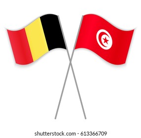 Belgian and Tunisian crossed flags. Belgium combined with Tunisia isolated on white. Language learning, international business or travel concept.