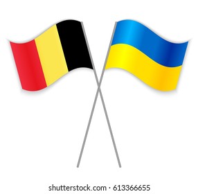 Belgian and Ukrainian crossed flags. Belgium combined with Ukraine isolated on white. Language learning, international business or travel concept.