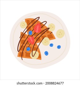 Belgian waffles for breakfast. Flat hand drawn textured wafers with chocolate topping, banana and berries. Yummy dessert for morning meal.