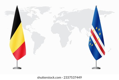 Belgium and Cape Verde flags for official meeting against background of world map.