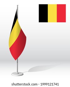 Belgium flag on flagpole for registration of solemn event, meeting foreign guests. National independence day of Belgium. Realistic 3D vector on white