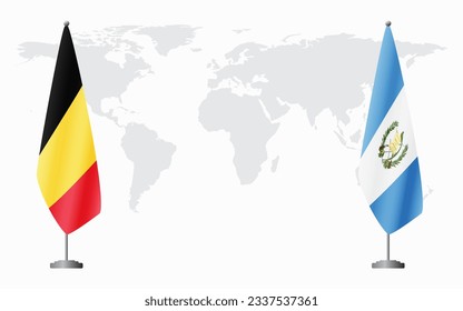 Belgium and Guatemala flags for official meeting against background of world map.