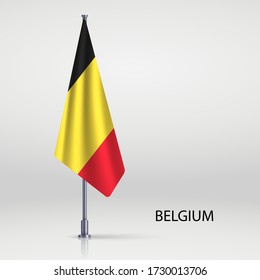 Belgium hanging flag on flagpole