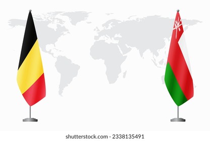 Belgien und Oman Flaggen für offizielle Treffen auf dem Hintergrund der Weltkarte.