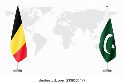 Belgium and Pakistan flags for official meeting against background of world map.