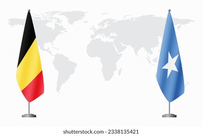 Belgium and Somalia flags for official meeting against background of world map.