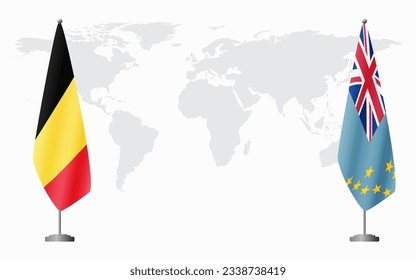 Belgium and Tuvalu flags for official meeting against background of world map.