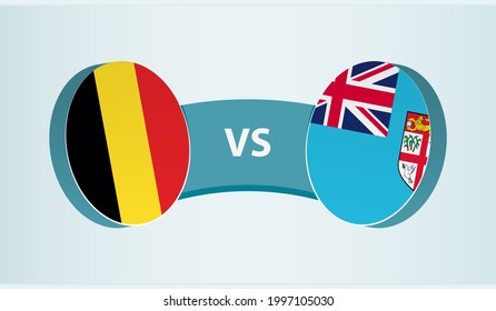 Belgium versus Fiji, team sports competition concept. Round flag of countries.