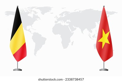 Belgium and Vietnam flags for official meeting against background of world map.