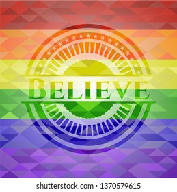 Believe emblem on mosaic background with the colors of the LGBT flag
