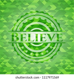 Believe green emblem with mosaic background