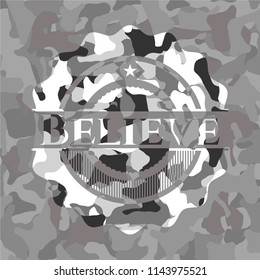Believe on grey camouflage texture