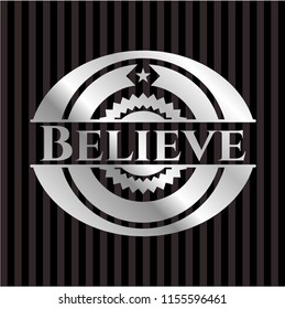 Believe silver badge or emblem