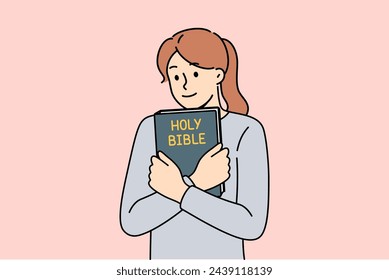 Believing woman embraces bible and feels enlightened after reading religious christian book with sermons or prayers. Holy bible in hands of teenage girl who wants to start study orthodoxy