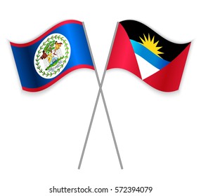 Belizean and Antiguan crossed flags. Belize combined with Antigua and Barbuda isolated on white. Language learning, international business or travel concept.