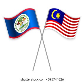 Belizean and Malaysian crossed flags. Belize combined with Malaysia isolated on white. Language learning, international business or travel concept.