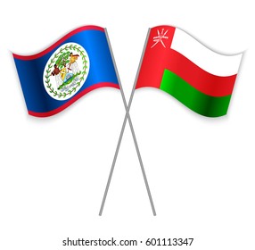 Belizean and Omani crossed flags. Belize combined with Oman isolated on white. Language learning, international business or travel concept.