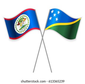 Belizean and Solomon Island crossed flags. Belize combined with Solomon Islands isolated on white. Language learning, international business or travel concept.