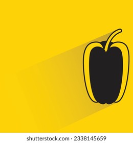 bell pepper with shadow on yellow background