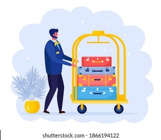 Bellhop carrying luggage and bags by trolley, cart. Smiling bellboy. Hotel staff