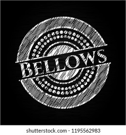 Bellows on chalkboard