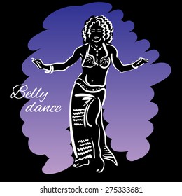 Belly dancer. Young beautiful woman is showing belly dance in special costume.