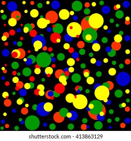 below the balls of different sizes and colors on a black background