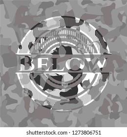Below on grey camouflage texture