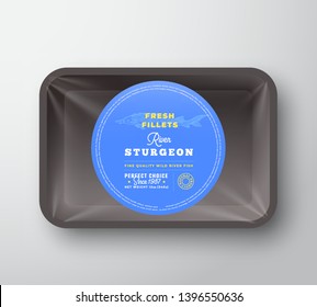 Beluga Fillets. Abstract Vector Fish Plastic Tray with Cellophane Cover Packaging Design Round Label or Sticker. Retro Typography and Hand Drawn Sturgeon Silhouette Background Layout. Isolated.