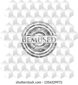 Bemused grey badge with geometric cube white background