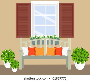 bench with flowerpots and window