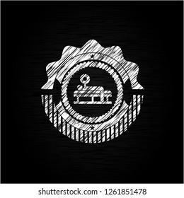 bench press icon drawn on a chalkboard