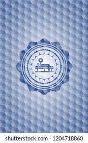 bench press icon inside blue emblem with geometric background.