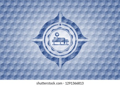 bench press icon inside blue polygonal badge.