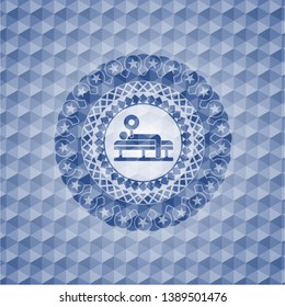 bench press icon inside blue emblem with geometric pattern background.