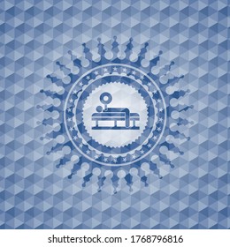 bench press icon inside blue polygonal emblem. 